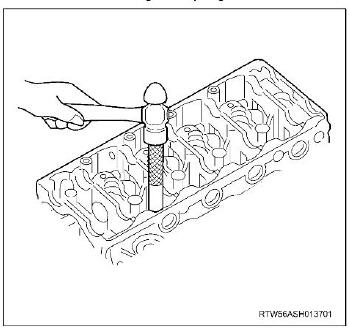 ISUZU-4JJ1-Engine-Valve-Stem-Seal-and-Spring-Removal-Installation-9